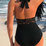Maillot de bain une pièce dos nu et plis en dentelle