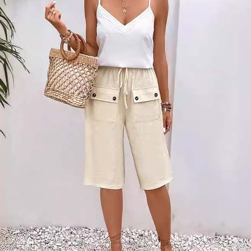 Pantalon mi-long décontracté avec poche de couleur unie