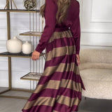 Robe élégante à rayures et à bretelles