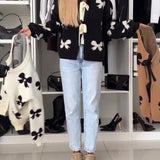 Cardigan à lacets avec perles et nœud