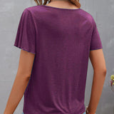 T-shirt à découpes de couleur unie