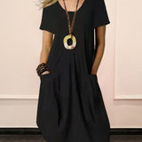 Robe unie col rond manches courtes