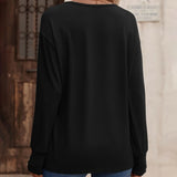 Haut à manches longues boutonné à col en V de couleur unie