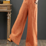 Pantalon large taille haute de couleur unie