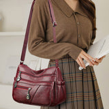 Sac bandoulière en cuir souple avec multipoches
