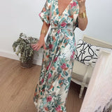 Robe élégante torsadée à col en V et imprimé botanique