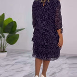 Robe élégante superposée à imprimé pois