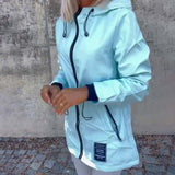 Manteau à fermeture éclair et cordon de serrage