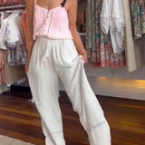 Pantalon large confortable de couleur unie avec poches