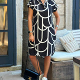 Robe midi imprimée à manches courtes et ligne de revers