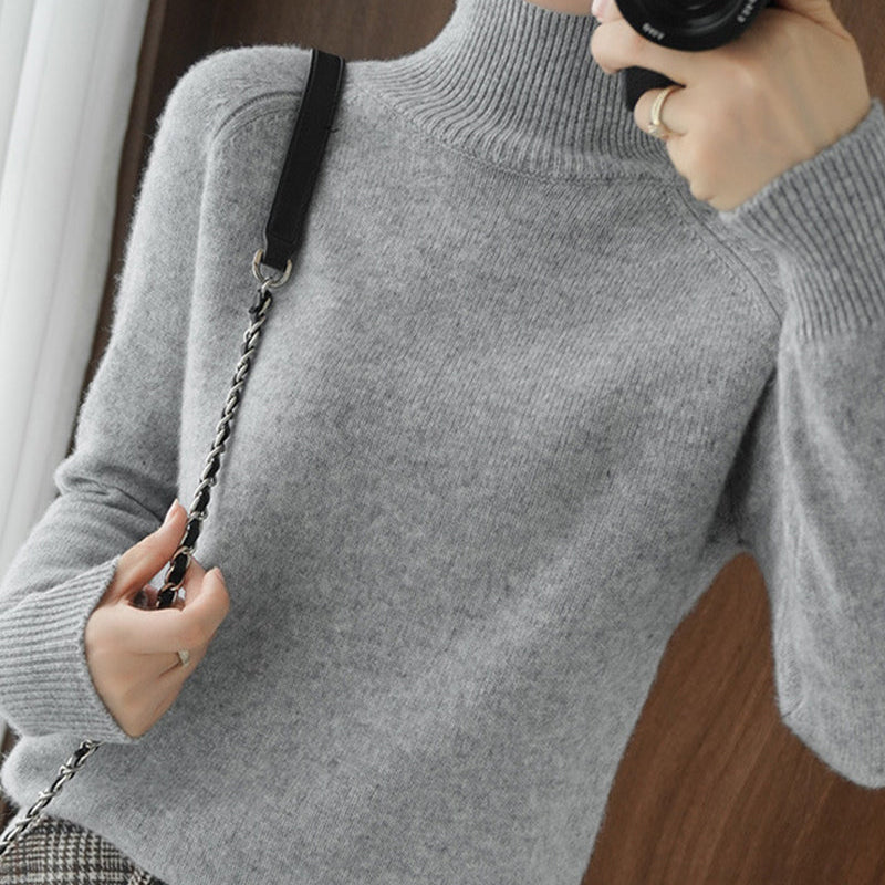 Pull simple à manches longues et col haut de couleur unie