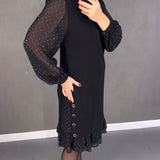 Robe élégante à pois et manches longues