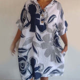 Robe à poches à revers et imprimé floral
