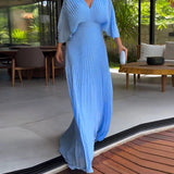 Robe à plis et taille cintrée