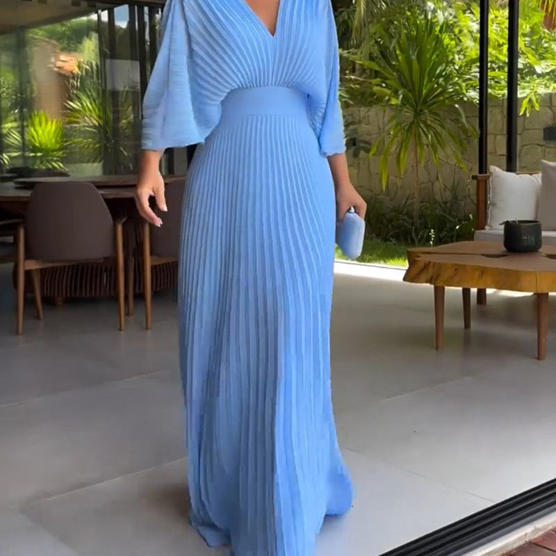 Robe à plis et taille cintrée