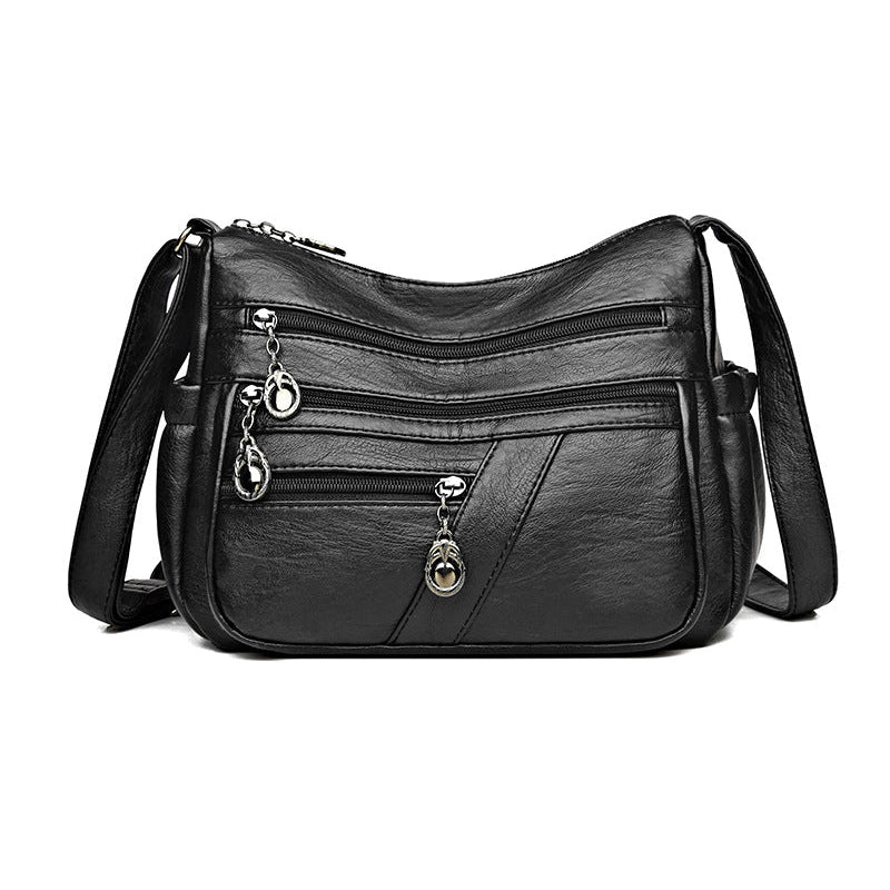 Sac bandoulière en cuir souple avec multipoches