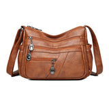 Sac bandoulière en cuir souple avec multipoches