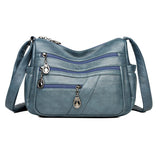 Sac bandoulière en cuir souple avec multipoches