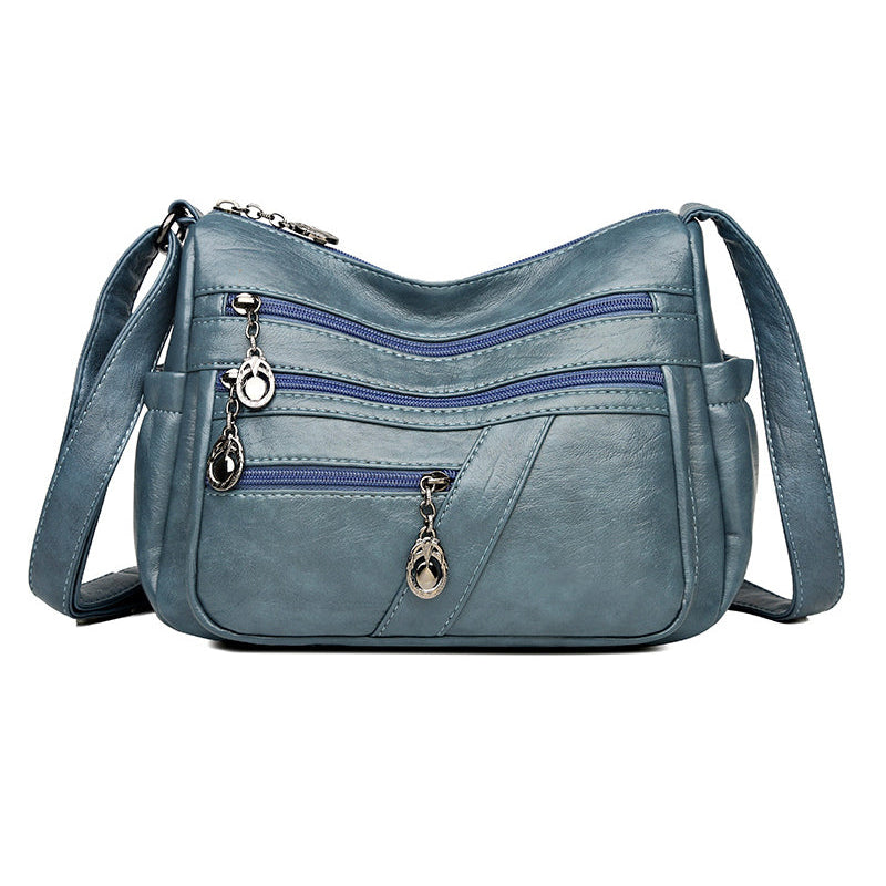 Sac bandoulière en cuir souple avec multipoches