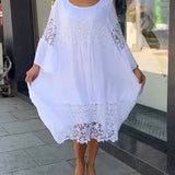 Robe en dentelle à col rond