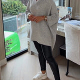 Pull Avec Caractéristiques Col V, Boutonné Et Asymétrique