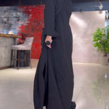 Robe longue ample avec revers et fente latérale