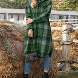 Manteau à carreaux avec boutons à revers