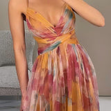 Robe d’été fluide à imprimé fleuri – silhouette féminine et légère