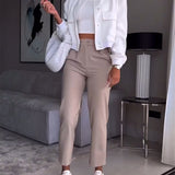 Pantalon de costume décontracté à poches de couleur unie