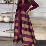 Robe élégante à rayures et à bretelles