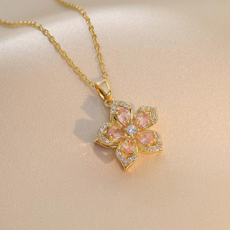 Collier pendentif rotatif à 360° à cinq pétales de fleur