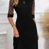 Élégante Robe Avec Des Panneaux De Tulle