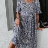 Robe élégante à col rond et imprimé floral