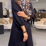 Robe élégante de couleur unie
