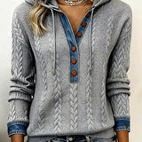 Sweat à capuche à coupe de couleur et boutons