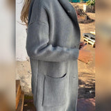 Cardigan décontracté à capuche avec poche boutonnée de couleur unie