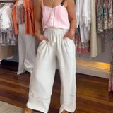 Pantalon large confortable de couleur unie avec poches