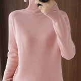 Pull simple à manches longues et col haut de couleur unie