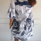 Robe à poches à revers et imprimé floral