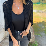 Manteau élégant avec design en tricot ajouré