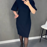 Robe élégante à manches courtes bouffantes