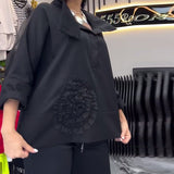 Blouse fleurie patchwork en dentelle à revers