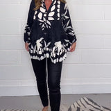 Blouse imprimée à manches cloche et boutons