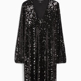 Robe élégante à paillettes de couleur unie et col en V