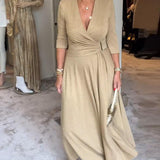 Robe élégante de couleur unie avec col en V et manches trois-quarts