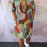 Robe à poches imprimée colorée avec col en V et demi-manches