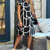 Robe midi imprimée à manches courtes et ligne de revers