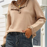 Pull décontracté de couleur unie avec bouton à revers et volants