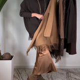 Pull à col roulé et franges de couleur unie