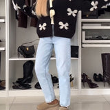 Cardigan à lacets avec perles et nœud